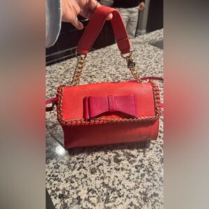 Chic Red Leather Bag with Gold Chain